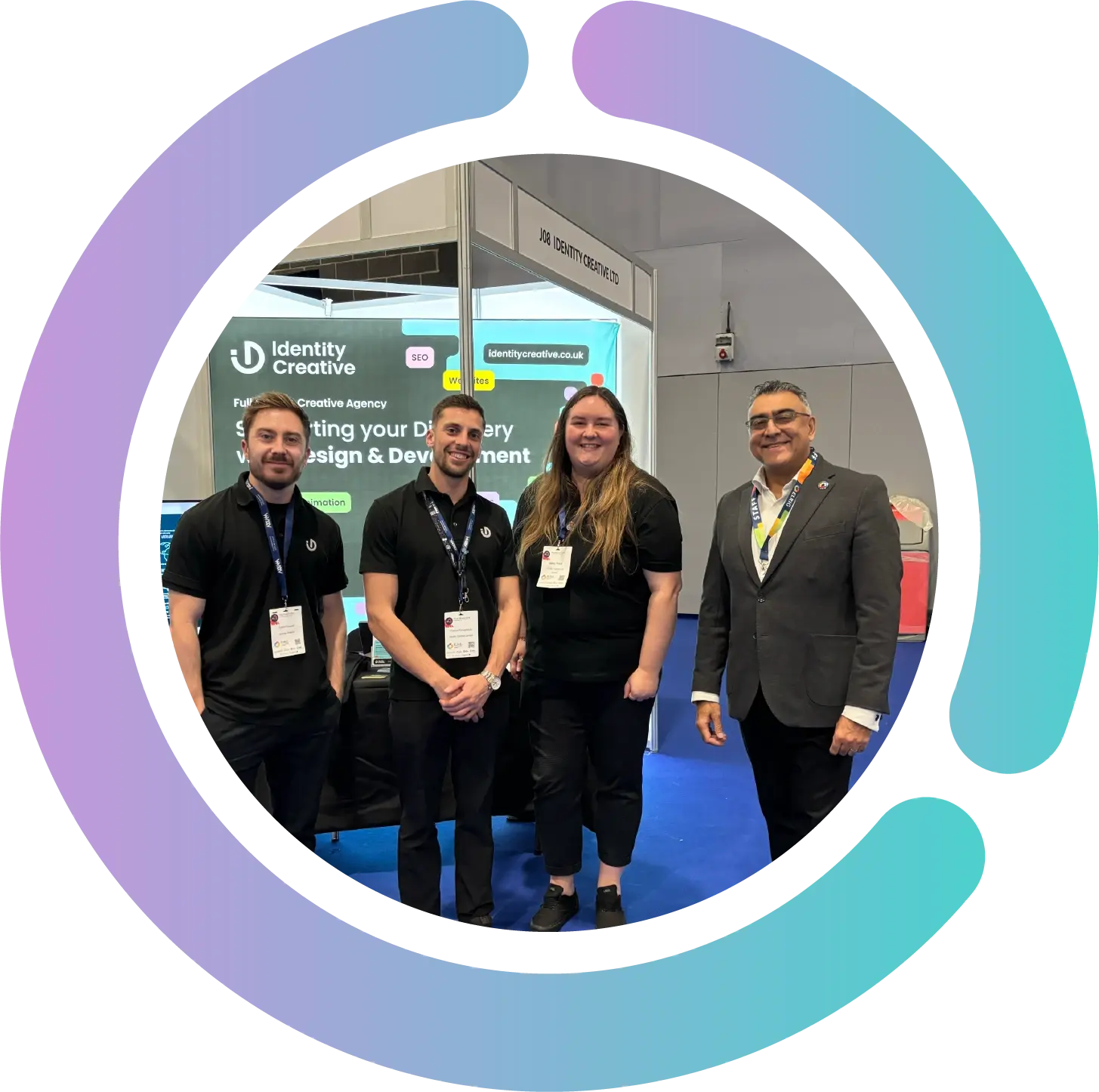 Team photograph of Identity Creative and ELRIG CEO Sanj Kumar at Drug Discovery life science exhibition in Birmingham